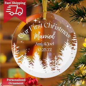 Our First Christmas Married Ornament 2024 clear glass with white forest and a starry sky. Married personalized with names and date.