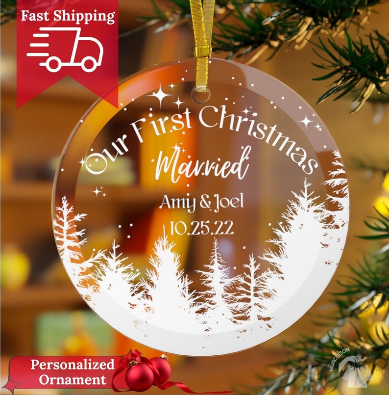 Our First Christmas Married Ornament 2024 clear glass with white forest and a starry sky. Married personalized with names and date.