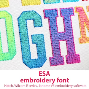 May include: Close-up of embroidered letters in a rainbow gradient on white fabric. The letters are part of the word "DOGH". The image also includes the text "ESA embroidery font".