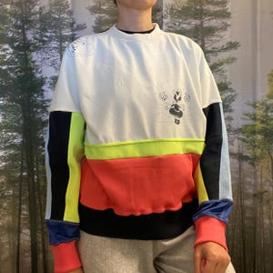 Upcycled Color Block Sweatshirt, Unique Cartoon Graphic Crewneck, EU Size M, Reworked Streetwear Jumper, Sustainable Fashion Gift