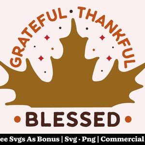 May include: A fall-themed graphic with the words "Grateful," "Thankful," and "Blessed" in a warm color palette. A stylized brown leaf shape is the central design element, with small red diamond shapes and dots. The image also includes text about free SVGs.