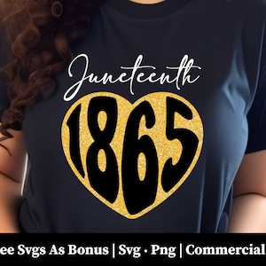 May include: A black t-shirt with the text "Juneteenth 1865" in white lettering. The number 1865 is in a gold glitter heart shape.