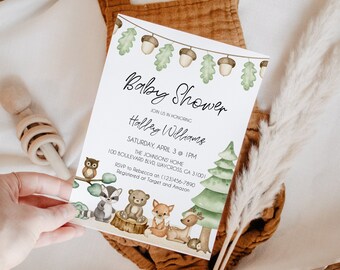 May include: A white baby shower invitation with green and brown woodland animals, including an owl, raccoon, bear, fox, and deer. The invitation features the text "Baby Shower" and "Join us in honoring Halley Williams". The date and time of the shower are listed as "Saturday, April 3 @ 1PM". The location is listed as "The Johnsons Home, 100 Boulevard Blvd, Waycross CA 31001". The RSVP information is listed as "RSVP to Rebecca at (123)456-7890". The registry information is listed as "Registered at Target and Amazon".