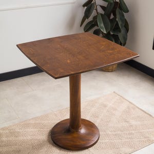 We combine square dining table with tulip leg round side oak wood dining room table. Here is small space table 2 to 4 person seat table as a home kitchen furniture! This oak wood dine table will be absolutely fantastic space saving table