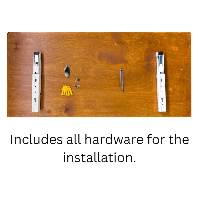 May include: A close-up of a wooden shelf with two white metal brackets and hardware for installation. The hardware includes screws, anchors, and a drill bit.