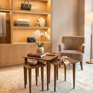Walnut Wood Nesting End Table Set of 3

Small Side Coffee Table | Mid Century Modern Square Nest Table | Livingroom Furniture

Create a stylish and functional living space with this walnut wood nesting end table set. Perfect for small living rooms, apartments, or cozy corners, these tables save space while adding a modern mid-century charm.

You can purchase the tables as a set of 3, as a single table, or as a pair. Simply select your preferred option from the dropdown menu.