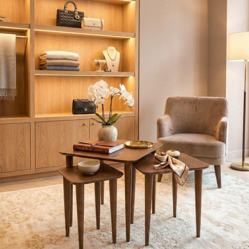 Walnut Wood Nesting End Table Set of 3

Small Side Coffee Table | Mid Century Modern Square Nest Table | Livingroom Furniture

Create a stylish and functional living space with this walnut wood nesting end table set. Perfect for small living rooms, apartments, or cozy corners, these tables save space while adding a modern mid-century charm.

You can purchase the tables as a set of 3, as a single table, or as a pair. Simply select your preferred option from the dropdown menu.