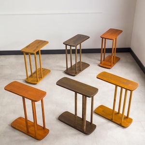 Looking for the perfect sidekick for your living space? Check out our wood narrow side table and slim end table storage design! Whether you need a modern coffee table, a c-shape side table, or a chic narrow side table, we’ve got you covered.