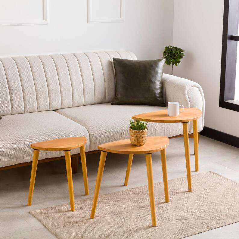 🌰 Nesting End Side Coffee Table Set of 3 – Walnut Pine Wood | Mid-Century Modern Small Nest of Table

Bring timeless mid-century modern charm to your living space with this nesting coffee table set of 3.
Crafted from premium pine wood with a rich walnut finish, these tables are designed for style, durability, and versatility — perfect for small spaces, living rooms, or as side tables by the sofa.
