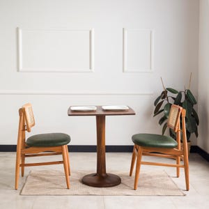 We combine square dining table with tulip leg round side oak wood dining room table. Here is small space table 2 to 4 person seat table as a home kitchen furniture! This oak wood dine table will be absolutely fantastic space saving table