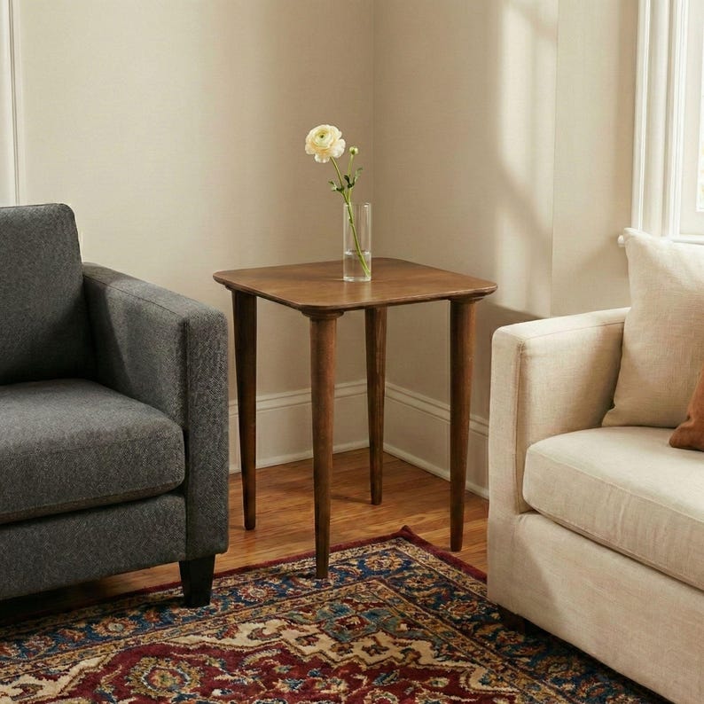 Walnut Wood Nesting End Table Set of 3

Small Side Coffee Table | Mid Century Modern Square Nest Table | Livingroom Furniture

Create a stylish and functional living space with this walnut wood nesting end table set. Perfect for small living rooms, apartments, or cozy corners, these tables save space while adding a modern mid-century charm.

You can purchase the tables as a set of 3, as a single table, or as a pair. Simply select your preferred option from the dropdown menu.