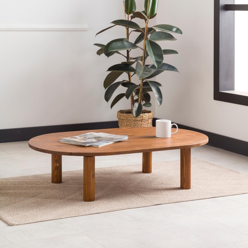We combine Oval Low Coffee Table Walnut Wood with Mid Century Modern Coffee Table. Here is Unique Center Table as a Livingroom Furniture! This Wooden Large Coffee Table will be absolutely fantastic large coffee table.
