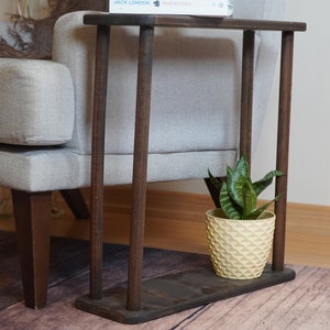 This item is Narrow Side Table near for the Livingroom Couch. It has Solid Wood and handmade for your Sofa. Our Rectangle Slim End Table has Modern design as a Coffee Table.