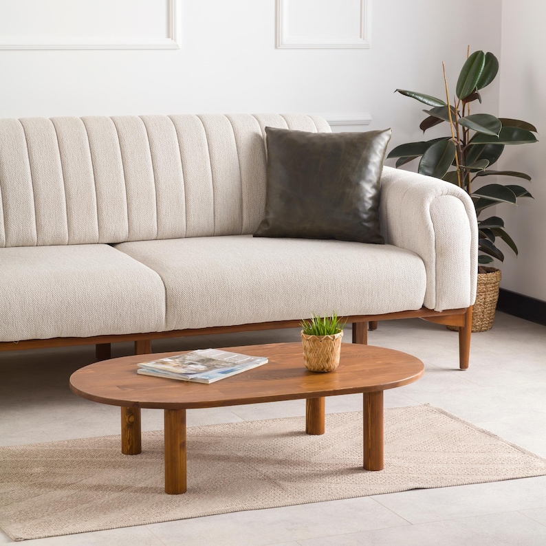 We combine Oval Low Coffee Table Walnut Wood with Mid Century Modern Coffee Table. Here is Unique Center Table as a Livingroom Furniture! This Wooden Large Coffee Table will be absolutely fantastic large coffee table.