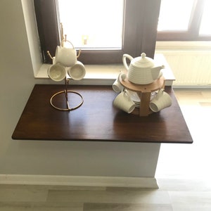 This is Small Spacesaver Solution Murphy Desk Table. It will be use for Computer Laptop. It will be Folding Work Desk or Foldable Table. Home Office Study Desk, Apartment Dorm Room Desk