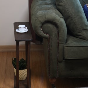 This item is Narrow Side Table near for the Livingroom Couch. It has Solid Wood and handmade for your Sofa. Our Rectangle Slim End Table has Modern design as a Coffee Table.