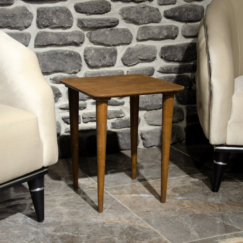 Here’s Square Walnut Wood Nesting End Table Set of 3! This Small Side Coffee Table will be absolutely fantastic Furniture Decor in your home. Your living room underwent a transformation with the addition of a Mid Century Modern style