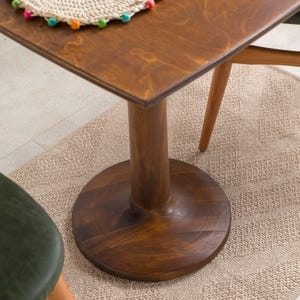 We combine square dining table with tulip leg round side oak wood dining room table. Here is small space table 2 to 4 person seat table as a home kitchen furniture! This oak wood dine table will be absolutely fantastic space saving table