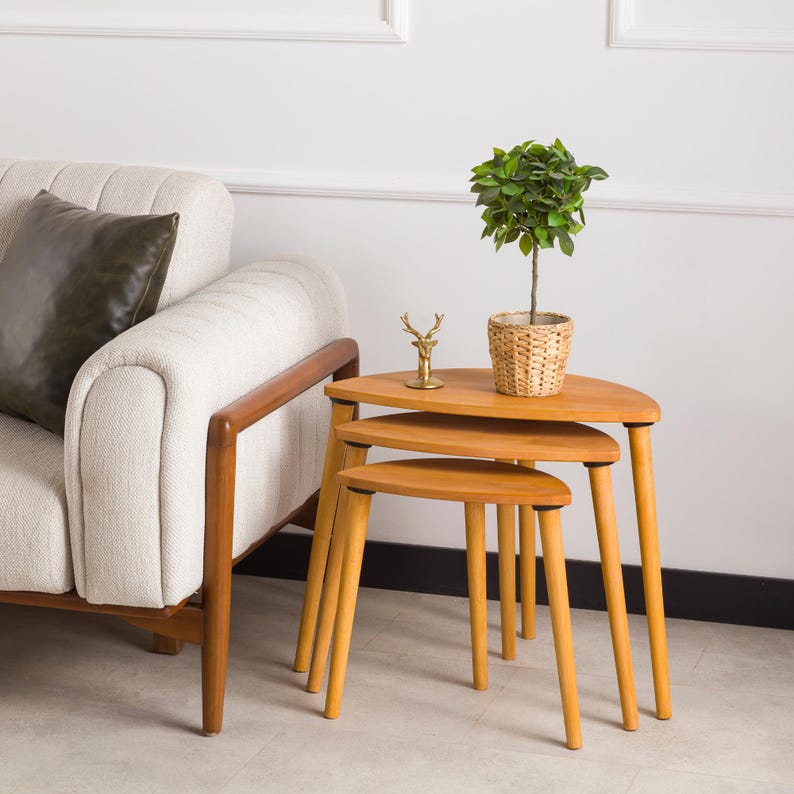 🌰 Nesting End Side Coffee Table Set of 3 – Walnut Pine Wood | Mid-Century Modern Small Nest of Table

Bring timeless mid-century modern charm to your living space with this nesting coffee table set of 3.
Crafted from premium pine wood with a rich walnut finish, these tables are designed for style, durability, and versatility — perfect for small spaces, living rooms, or as side tables by the sofa.