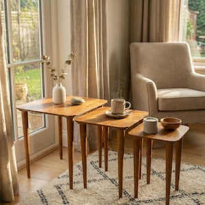 Walnut Wood Nesting End Table Set of 3

Small Side Coffee Table | Mid Century Modern Square Nest Table | Livingroom Furniture

Create a stylish and functional living space with this walnut wood nesting end table set. Perfect for small living rooms, apartments, or cozy corners, these tables save space while adding a modern mid-century charm.

You can purchase the tables as a set of 3, as a single table, or as a pair. Simply select your preferred option from the dropdown menu.