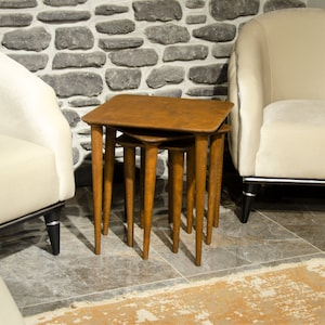 Here’s Square Walnut Wood Nesting End Table Set of 3! This Small Side Coffee Table will be absolutely fantastic Furniture Decor in your home. Your living room underwent a transformation with the addition of a Mid Century Modern style