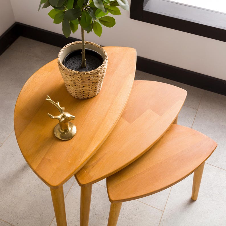 🌰 Nesting End Side Coffee Table Set of 3 – Walnut Pine Wood | Mid-Century Modern Small Nest of Table

Bring timeless mid-century modern charm to your living space with this nesting coffee table set of 3.
Crafted from premium pine wood with a rich walnut finish, these tables are designed for style, durability, and versatility — perfect for small spaces, living rooms, or as side tables by the sofa.