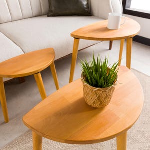 🌰 Nesting End Side Coffee Table Set of 3 – Walnut Pine Wood | Mid-Century Modern Small Nest of Table

Bring timeless mid-century modern charm to your living space with this nesting coffee table set of 3.
Crafted from premium pine wood with a rich walnut finish, these tables are designed for style, durability, and versatility — perfect for small spaces, living rooms, or as side tables by the sofa.