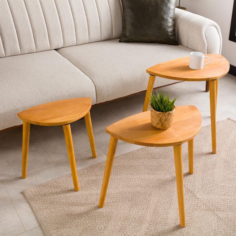 🌰 Nesting End Side Coffee Table Set of 3 – Walnut Pine Wood | Mid-Century Modern Small Nest of Table

Bring timeless mid-century modern charm to your living space with this nesting coffee table set of 3.
Crafted from premium pine wood with a rich walnut finish, these tables are designed for style, durability, and versatility — perfect for small spaces, living rooms, or as side tables by the sofa.