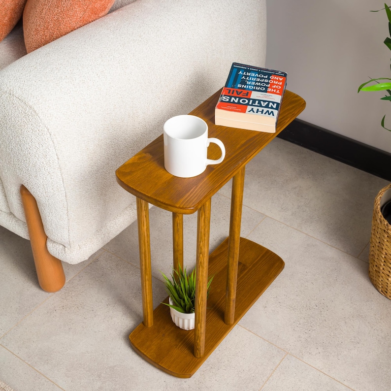 Looking for the perfect sidekick for your living space? Check out our wood narrow side table and slim end table storage design! Whether you need a modern coffee table, a c-shape side table, or a chic narrow side table, we’ve got you covered.