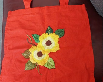 Red tote bag ...hand embroidered with wool in the centre ....Great gift