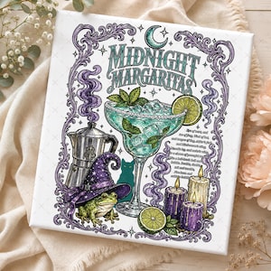 May include: A rectangular print featuring the text Midnight Margaritas, a cocktail glass with lime, a frog wearing a purple witch hat, a silver coffee pot, three candles, and a black cat silhouette, all framed by ornate purple scrollwork.