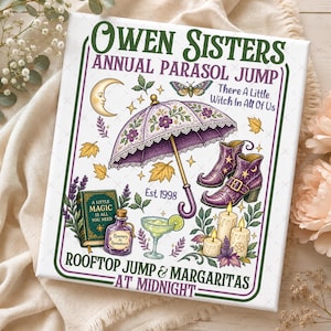 May include: A rectangular white canvas print featuring the text "OWEN SISTERS ANNUAL PARASOL JUMP" and "ROOFTOP JUMP & MARGARITAS AT MIDNIGHT". Illustrations include a purple floral parasol, a crescent moon, a book, a potion bottle, boots, and candles.