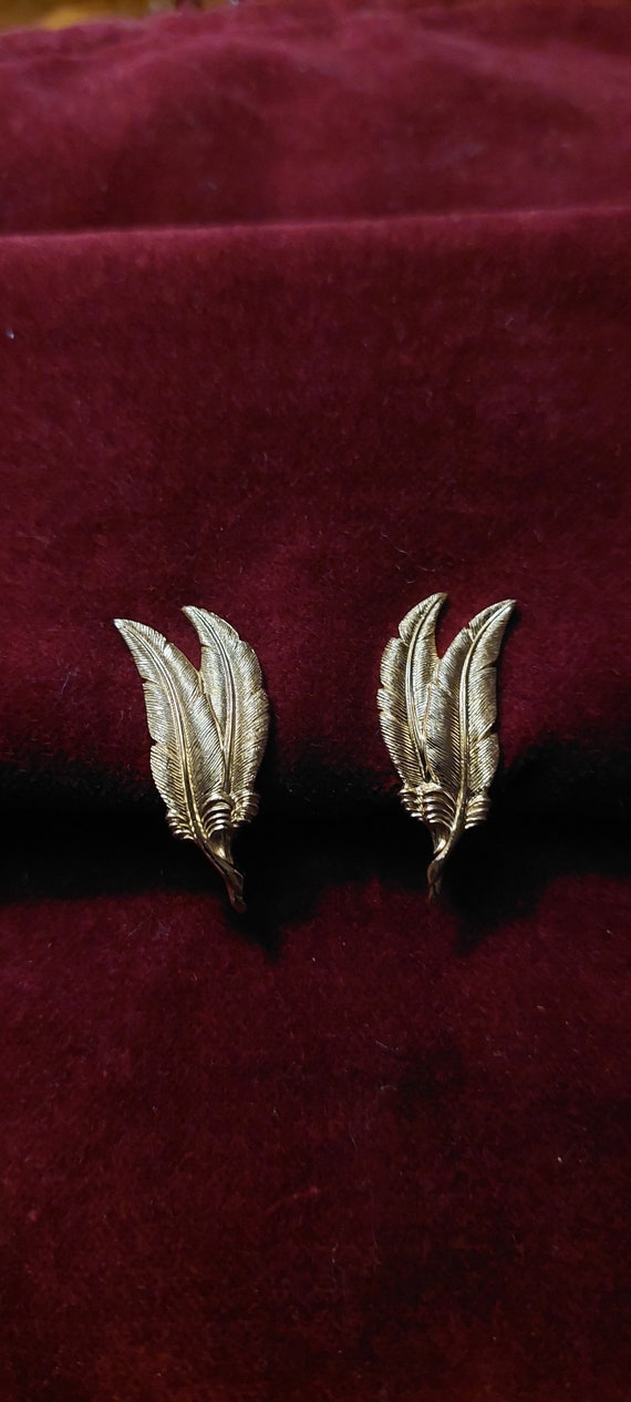 Vintage Signed Monet gold feather earrings