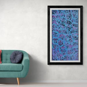 May include: Abstract art print in a black frame with a blue and purple swirling pattern.