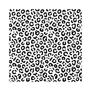 May include: A repeating pattern of black leopard spots on a white background. The spots vary in size and shape, creating a dynamic and textured design. This pattern is often used in fashion and home decor.