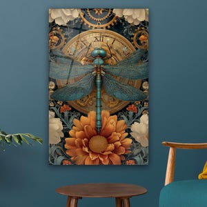 May include: A framed wall art print featuring a teal dragonfly over a clock face and a large orange flower. The artwork has a steampunk aesthetic with gears and floral elements. The background is a dark floral pattern.
