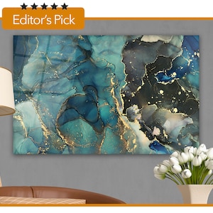 May include: Abstract wall art featuring a blend of teal, navy, and gold hues. The artwork has a fluid, marbled appearance, with the text "Editor's Pick" in the upper left corner. The piece is displayed on a gray wall.