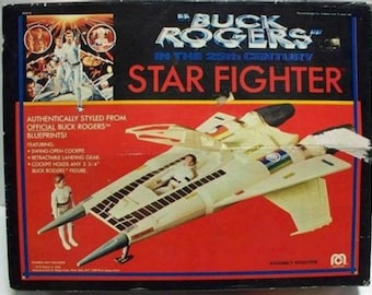Reproducciones de juguetes del mego de caza estelar de Buck Rogers