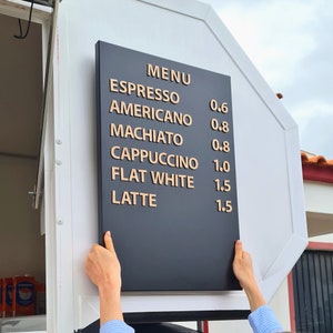 Menu board. Easily changeable metal menu board with wooden letters on magnets. Menu display for coffee shops, bars, bakeries.