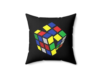 Almofada quadrada retrô em poliéster fiado, inspirada no brinquedo Cubo de Rubik dos anos 80.