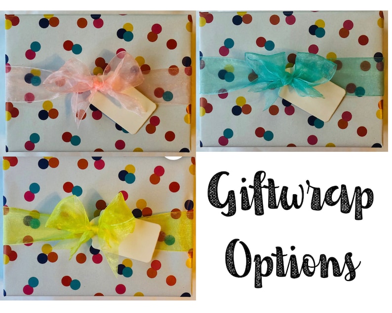 May include: Three gift boxes wrapped in white paper with a confetti pattern of colorful circles. Each box is tied with a different colored sheer ribbon: pink, teal, and yellow. The boxes are arranged in a grid pattern with the text "Giftwrap Options" below.