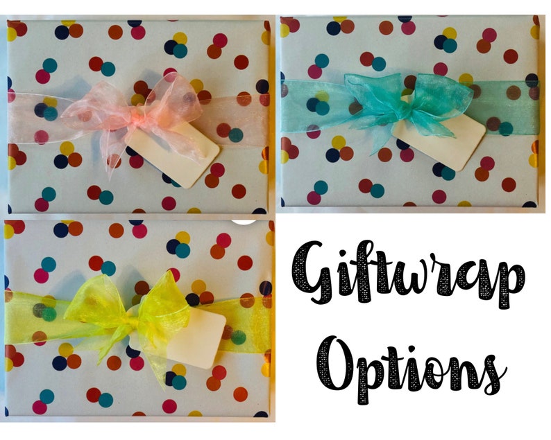 May include: Three gift boxes wrapped in white paper with a confetti pattern of colorful circles. Each box is tied with a different colored sheer ribbon: pink, teal, and yellow. The boxes are arranged in a grid pattern with the text "Giftwrap Options" below.