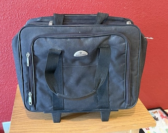 Maleta Samsonite negra expandible para portátil de negocios de 18 pulgadas con ruedas