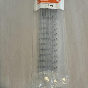 May include: A rustic wooden sign with the text "Welcome to our home" in white lettering. The sign features a distressed finish and a simple, inviting design, perfect for a front porch or entryway.