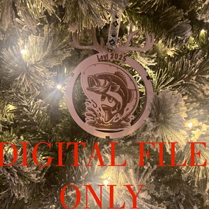 May include: A wooden Christmas ornament with a bass fish design, hanging on a Christmas tree. The ornament has the text "Levi 2025" and the words "DIGITAL FILE ONLY" in red. The ornament is brown and has a deer antler design.