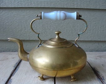 Vintage Footed Brass Tea Kettle with White Glass Handle