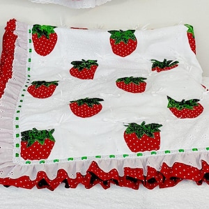 Strawberry quilt made by hand