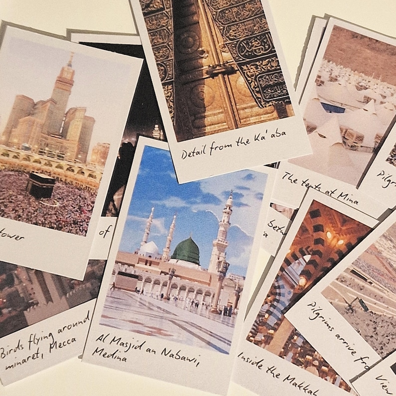 May include: A collection of Polaroid photos of the Kaaba in Mecca, Saudi Arabia. The photos show the Kaaba from different angles, including a close-up of the door, the surrounding area, and the mosque. The photos are labeled with handwritten captions, such as "Detail from the Ka'aba", "The tents at Mina", and "Pilgrims arrive for View".