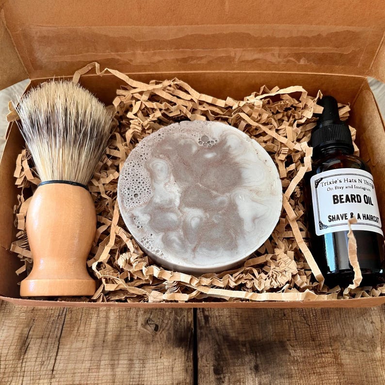 Small gift box includes: 1 shaving bar, shaving brush and beard oil.