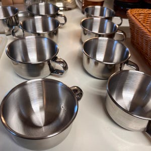 Stainless steel shaving bowls.
